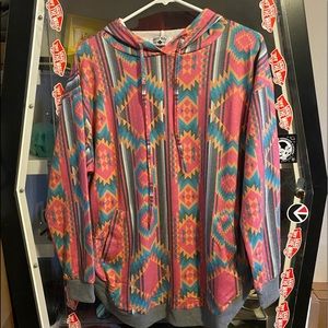 Never worn, Multi colored southwest print pullover with dual front pockets